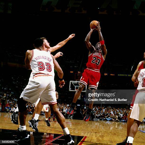 Michael Jordan of the Chicago Bulls shoots a jumpshot against the Miami Heat during game 4 of the 1997 Eastern Conference Finals NBA Semi-Finals at...