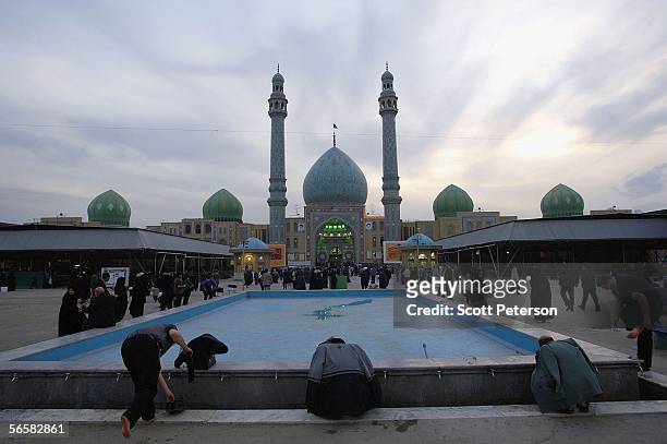 Iranian Shiites pray and wait for the return of the 12th Imam, or Mahdi, at the Jamkaran Mosque, east of the holy city of Qom on December 6, 2005 in...