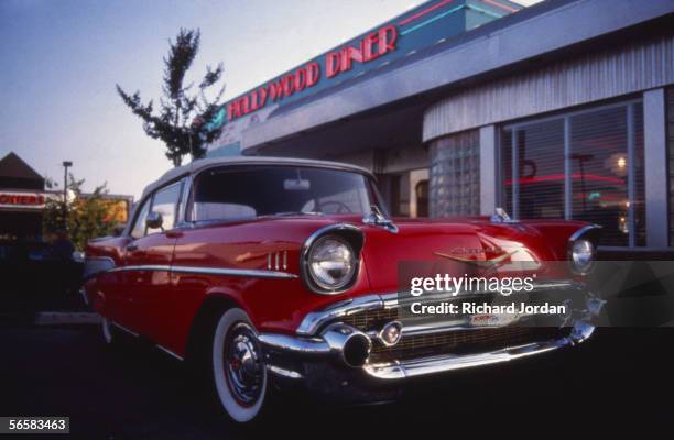 Chevrolet Bel Air two-tone convertible outside the Hollywood Diner on the corner of Sunset Boulevard and La Brea, Los Angeles, California, 1989.
