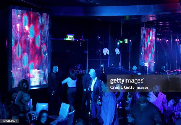 Patrons attend the grand opening of the Seamless Adult Ultra Lounge early December 18, 2005 in Las Vegas, Nevada.