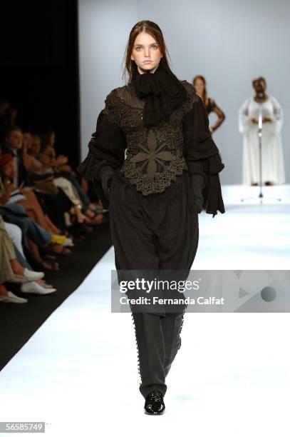 Model walks down the runway during the Marcia Ganem - Winter 2006 fashion show at Rio's Modern Art Museum during Rio Fashion Week on January 12, 2006...
