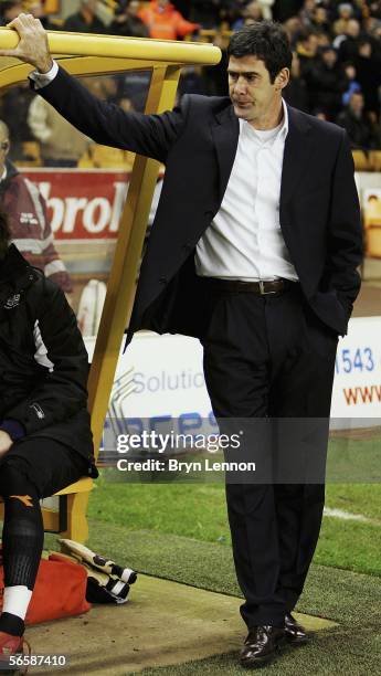 Luton Town Manager Mike Newell watches his team during the Coca-Cola Championship match between Wolverhampton Wanderers and Luton Town at The...