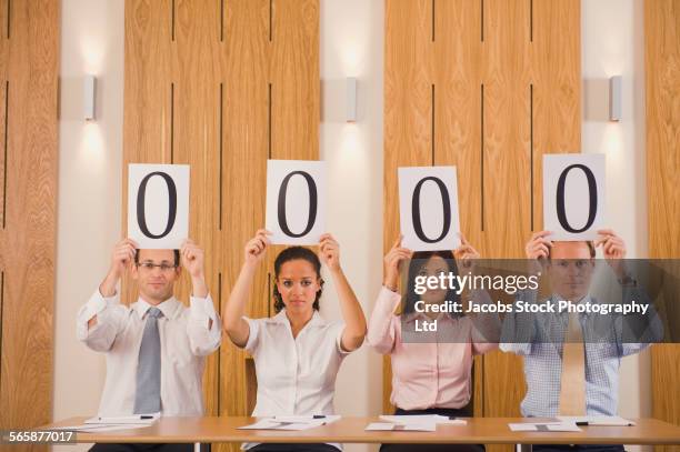 business people judges giving poor rating in competition - smart numbers office stockfoto's en -beelden