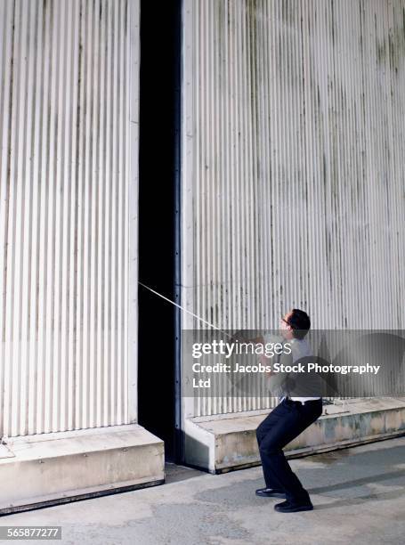 Pull By Rope 352 Man Pulling A Rope Side View Stock Photos, High-Res Pictures, and ...