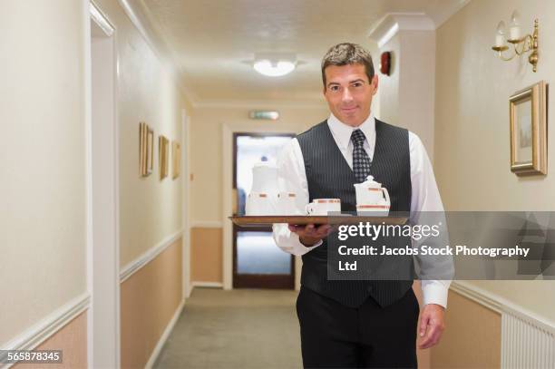 Hotel Butler Photos and Premium High Res Pictures - Getty Images