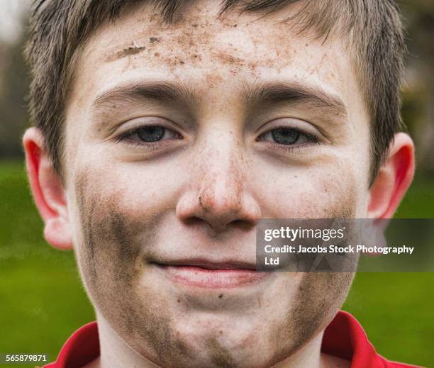 close up of dirty face of caucasian boy - kids mud stock pictures, royalty-free photos & images