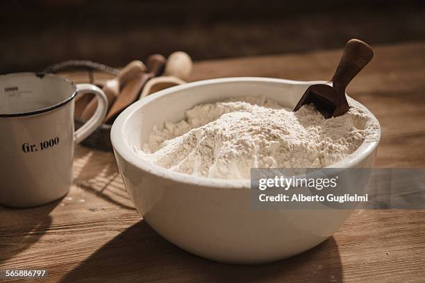 close up of bowl of flour with scoop - flour stock pictures, royalty-free photos & images