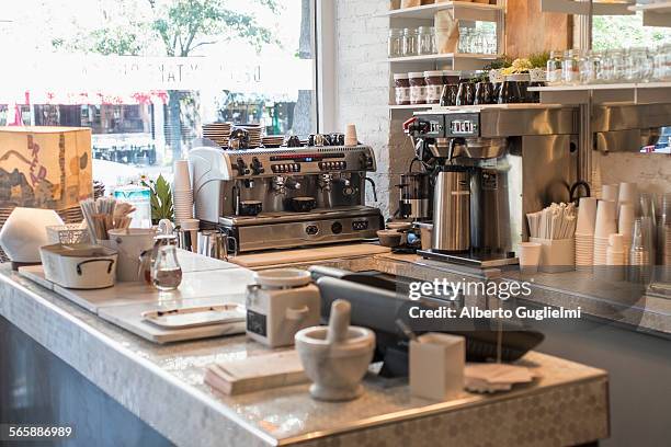 Empty counter and coffee makers in cafe