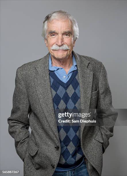 older caucasian man standing with hands in pockets - sweater vest - fotografias e filmes do acervo
