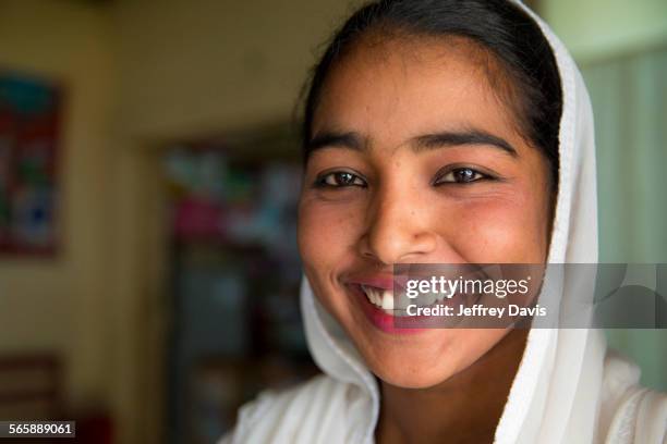 close up of smiling girl wearing headscarf - bangladesh stock pictures, royalty-free photos & images