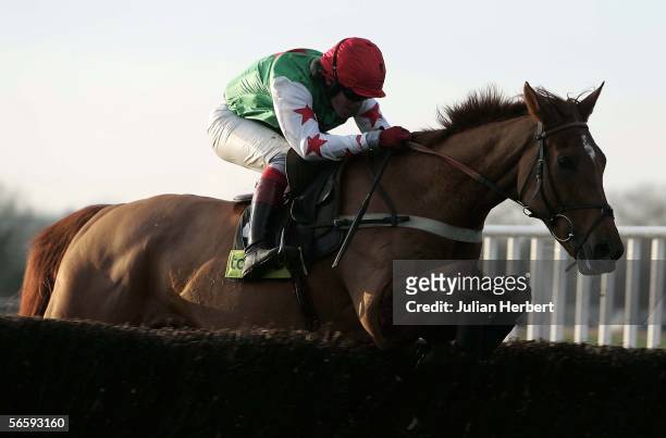 Robert Thornton and Halcon Genelardais clear the last fence to land The totepool Novices Steeple Chase Race run at Warwick Racecourse on January 14...