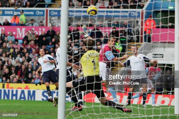 Lee Hendrie of Aston Villa scores against West Ham during the Barclays Priemiership match between Aston Villa and West Ham United at Villa Park on...