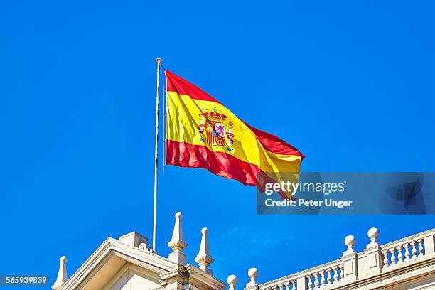 flag of spain on building roof, spain - spanische flagge stock-fotos und bilder