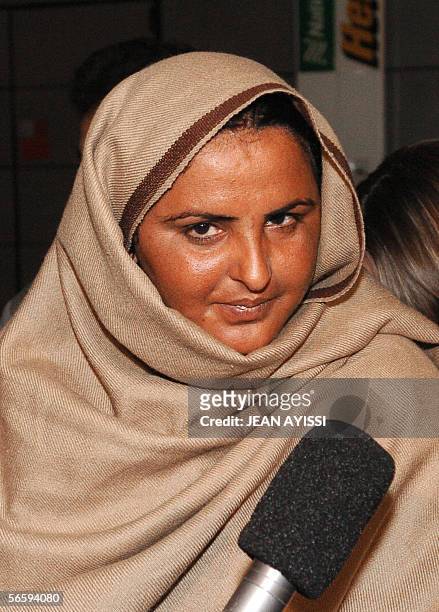 Mukhtar Mai, a Pakistani woman raped on orders of a tribal court is seen upon her arrival at Roissy Charles-de-Gaulle airport, northern Paris, 14...