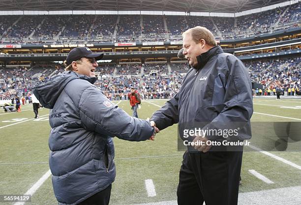 Paul Allen , owner of the Seattle Seahawks greets Mike Holmgren, head coach of the Seattle Seahawks before the NFC Divisional Playoff game at Qwest...
