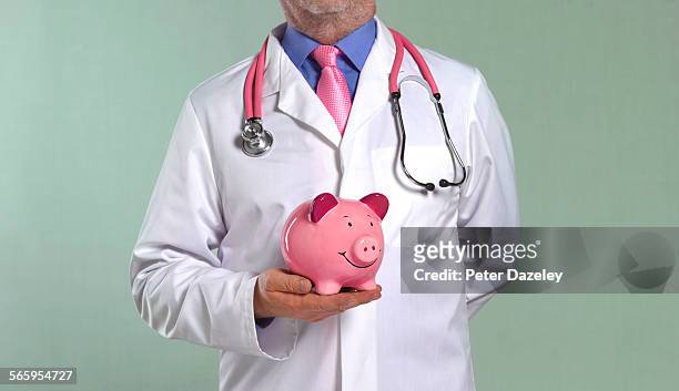 the cost of medical care - medical insurance stock-fotos und bilder