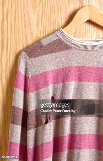 jumper with moth holes - ruined clothes stock pictures, royalty-free photos & images