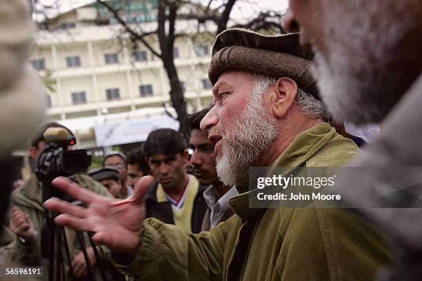 Protesters from Pakistani Islamic parties demonstrate against an alleged American airstrike in Pakistan's northwestern tribal areas on January 15,...