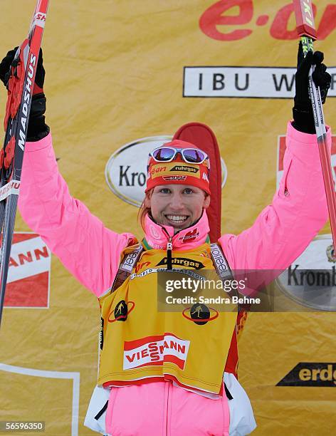 Kati Wilhelm of Germany celebrates after receiving the yellow bib for the world cup standing after the women's 10 km pursuit of the Biathlon World...