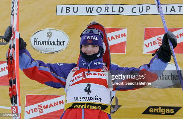 Liv Grete Poiree of Norway celebrates winning the women's 10 km pursuit of the Biathlon World Cup on January 15, 2006 in Ruhpolding, Germany.