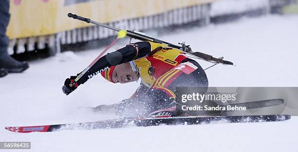 Kati Wilhelm of Germany struggles after crossing the finish line during the women's 10 km pursuit of the Biathlon World Cup on January 15, 2006 in...