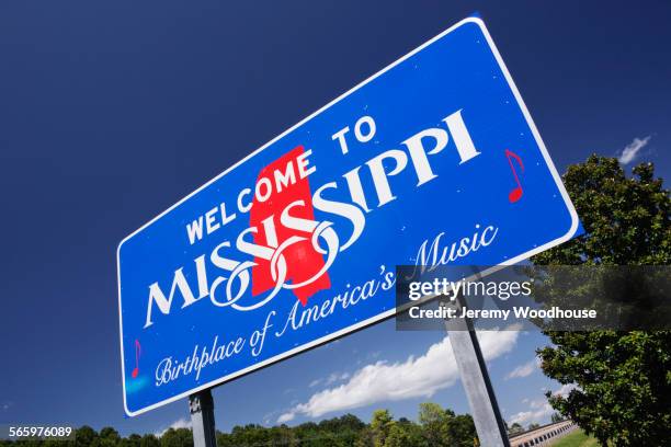 low angle view of welcome to mississippi sign, natchez, mississippi, united states - welcome sign ストックフォトと画像