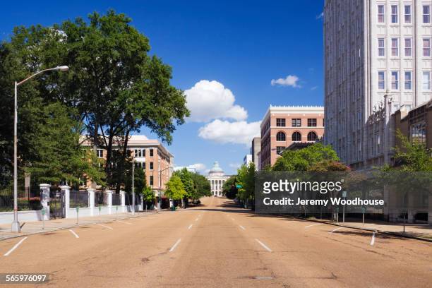 empty street to mississippi state capitol, jackson, mississippi, united states - mississippi stock-fotos und bilder