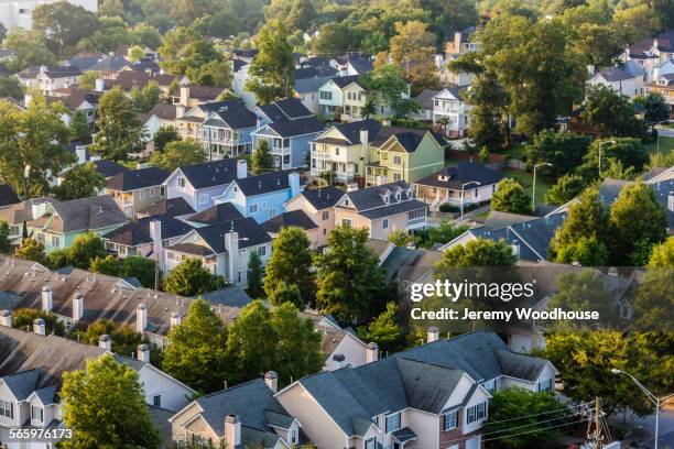 aerial view of house roofs in suburban neighborhood - atlanta georgia stock pictures, royalty-free photos & images