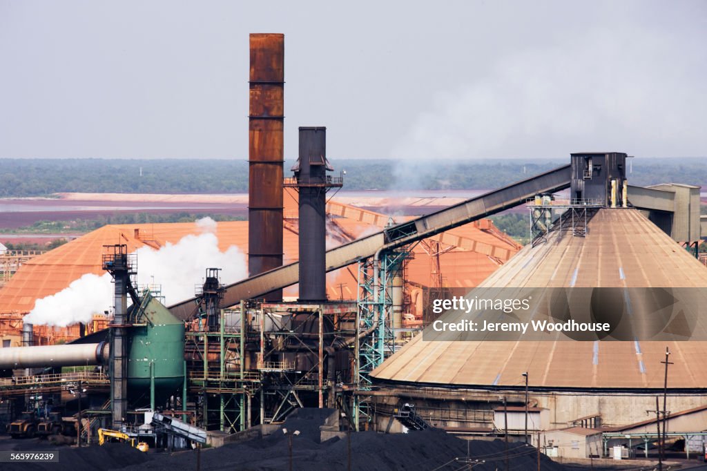 High angle view of industrial factory smokestacks