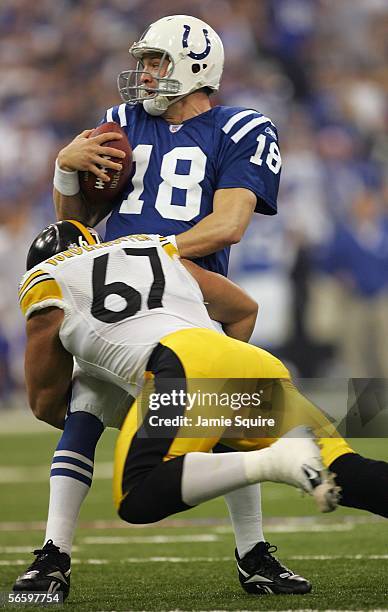 Peyton Manning of the Inidanapolis Colts is sacked by Kimo von Oelhoffen the Pittsburgh Steelers during the AFC Divisional Playoffs January 15, 2006...