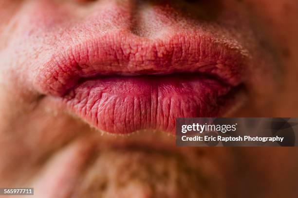 close up of lips of pouting caucasian man - juicy lips stock pictures, royalty-free photos & images
