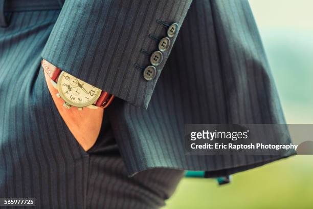 close up of hand in pocket of caucasian businessman - pinstripe stock pictures, royalty-free photos & images