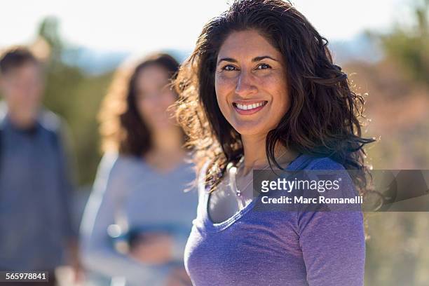 close up of woman smiling outdoors - 35 female outdoors stock-fotos und bilder