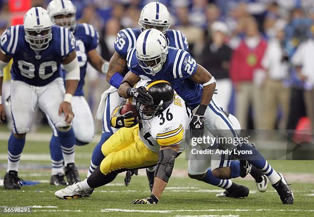 Nick Harper of the Inidanapolis Colts tackles Jerome Bettis of the Pittsburgh Steelers during the AFC Divisional Playoffs January 15, 2006 at the RCA...