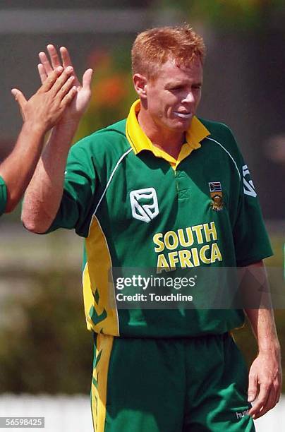 Shaun Pollock in action during the friendly match between the Queensland Academy XI and South Africa at the Allan Border field in Brisbane, Australia.