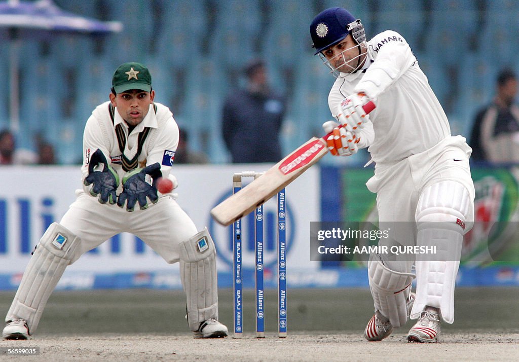 Indian batsman Virendra Sehwag (R) makes