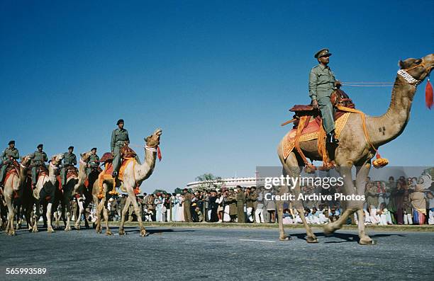 Military parade along the Rajpath in Delhi, India, possibly the Delhi Republic Day parade, circa 1965.