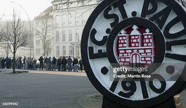 Supporters of FC.St.Pauli wait in front of the ticket centre during the sale of tickets for the German Cup match between FC St.Pauli and Werder...