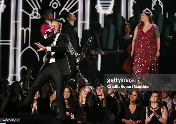 Couples are wedded as Macklemore and Ryan Lewis, Mary Lambert, Trombone Shorty and Madonna perform "Same Love" at the 56th Annual GRAMMY Awards at...