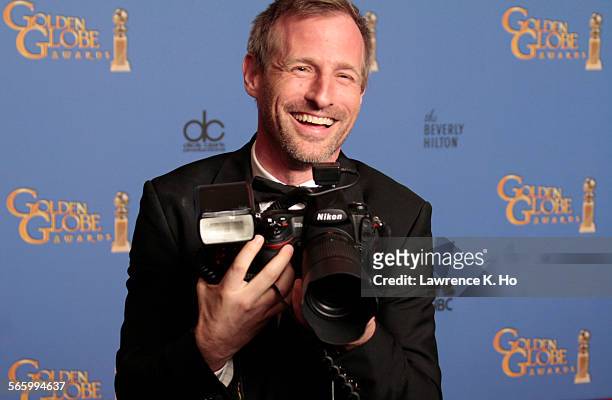 January 12, 2014 Spike Jonze with a photographer's camera in the deadline room after winning the Golden Globe for Best Screenplay for the movie "Her"...