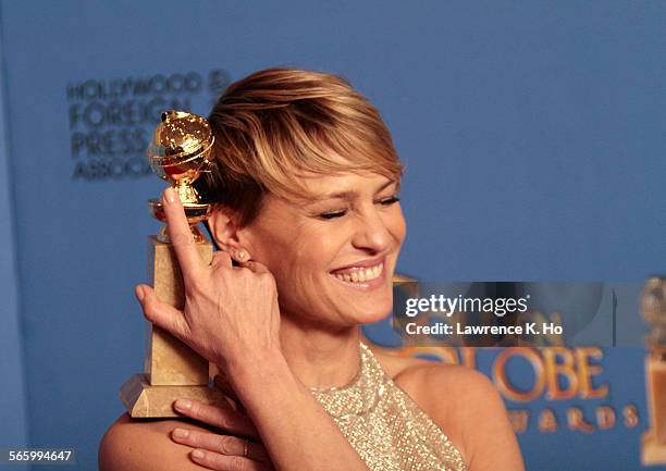 January 12, 2014 Robin Wright winning for Best Performance by an Actress in a Television Series Drama for "House of Cards" in the deadline room at...