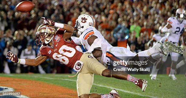 Auburn's Chris Davis is called for pass interference agsinst Florida St. Receiver Rashad Greene in the end zone to set up the wining touchdown in the...