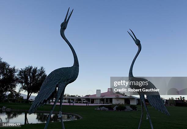 Two japanese crane sculptures adorn a private, nine hole golf course surrounds the pink tile roofed home of Walter Annenberg. Known as Sunnylands,...