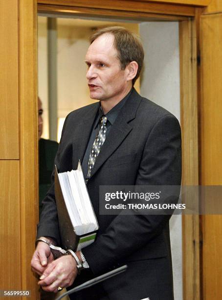 Germany: Germany's self-confessed cannibal Armin Meiwes arrives for the second day of his retrial for murder, 16 January 2006 at court in...