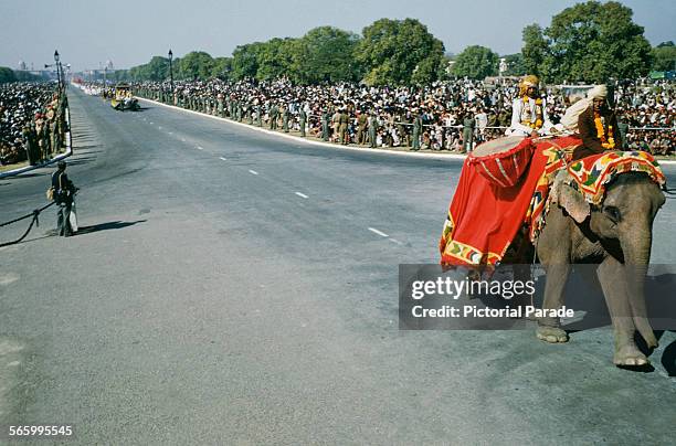 Military parade along the Rajpath in Delhi, India, possibly the Delhi Republic Day parade, circa 1965.