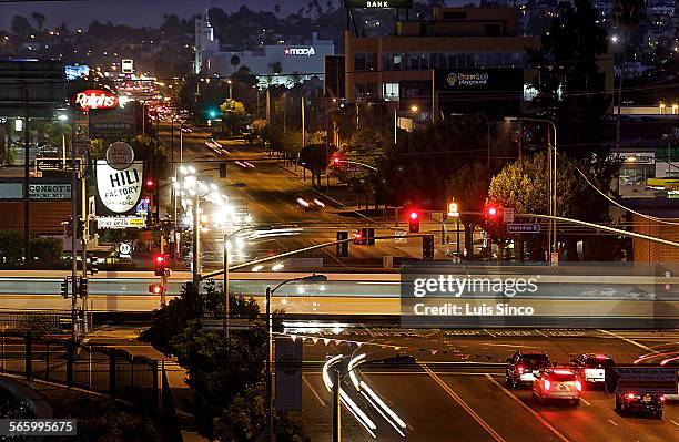 Metro Expo Line train crosses Crenshaw Boulevard at Exposition Boulevard in the Crenshaw District of Los Angeles. Development has started on the new...