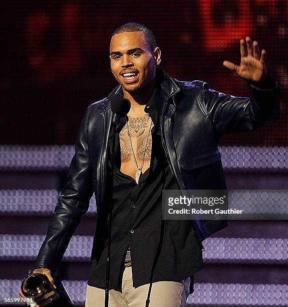 Chris Brown accepts his Grammy during coverage of the 54th Annual Grammy Awards at the Staples Center in Los Angeles on February 12, 2012.