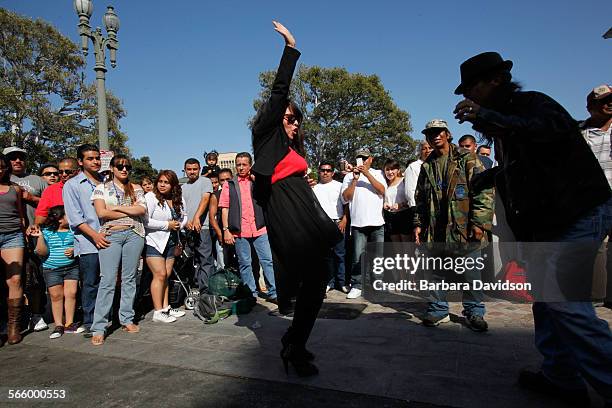 Karina Gonzalez salsa dances during a live performance at the Cinco de Mayo on Olvera Street festivities May 5, 2012. The day featured a traditional...