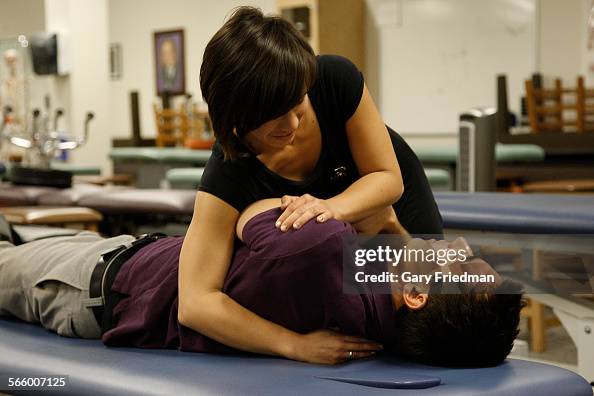 Sarah Fang, a 3rd year osteopathic medical student, does a lumbar roll (adjusting lumbar vertebrae) Sarah Fang, a 3rd year osteopathic medical student, does a lumbar roll (adjusting lumbar vertebrae)