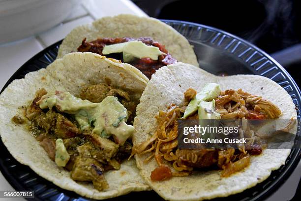 Beef Steak in Pimento Pork in Salsa Verde and Tinga Chicken are served on freshly made tortillas for food Find on Guisados in Boyle Heights on...